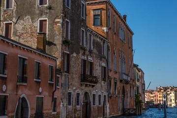 Fototapeta na wymiar Buildings and canal in Venice, Italy