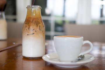 Ice macchiato coffee and hot coffee