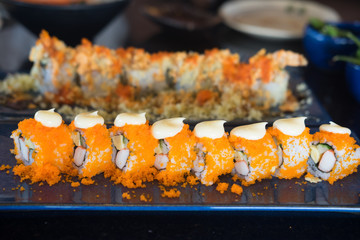 Sushi roll with shrimp eggs
