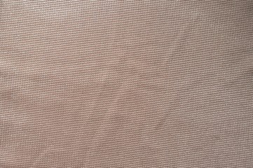 Jammed beige polyester fabric with sparkling fiber