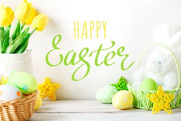 Happy Easter. Congratulatory easter background. Easter eggs and rabbit.