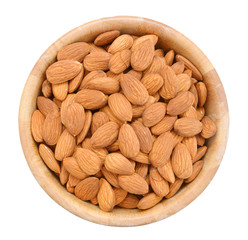 Almonds isolated on white background on wooden bowl