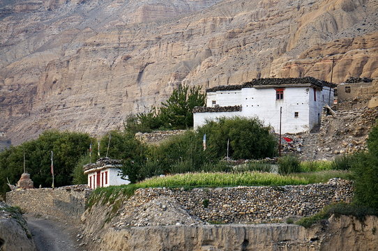 Nepalese house on the mountain at the entrance to the village of Chusang. Upper Mustang. Nepal.