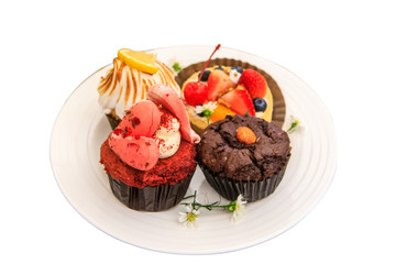 Fruit cake in the  plate isolated on white background with clipping path.