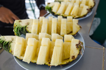 pineapple cut into pieces on the dish served on snorkeling trip,lipe isalsd ,Thailand