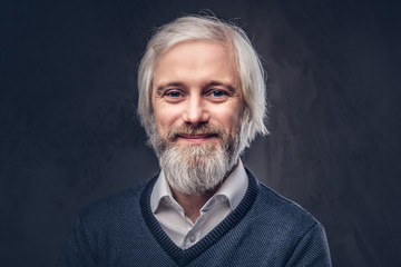 Portrait of an old man with a gray beard.