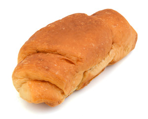 Single fresh croissant, casting soft whadow on white