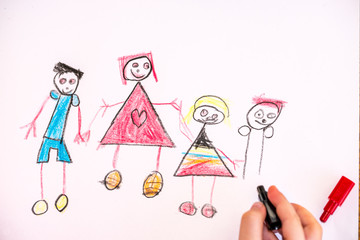 Young girl drawing cute family picture