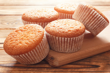 Group of cupcakes on wooden background