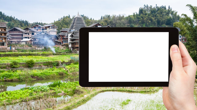 tourist photographs rice fields in Chengyang