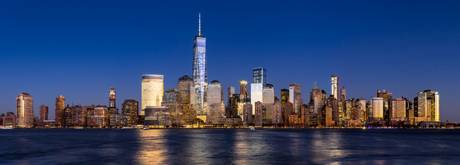 New York City Financial District skyline (Lower Manhattan) at twilight across the Hudson River