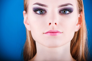 Fototapeta premium Close-up of a young girl face with creative visage face art