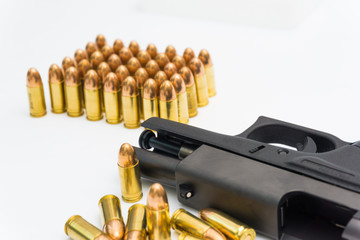 9mm bullet with semi automatic gun isolated on white