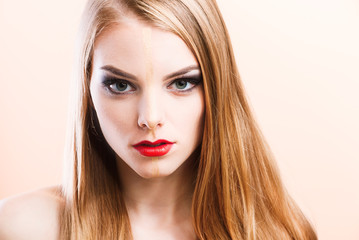 Fototapeta premium Close-up of a young girl face with creative visage face art
