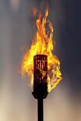 burning torch at night