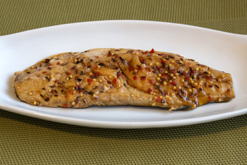 Hot-smoked mackerel with spices - garlic powder, mustard seed, dry onion, dried red pepper.