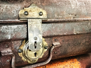 antique key lock on luggage made from brass