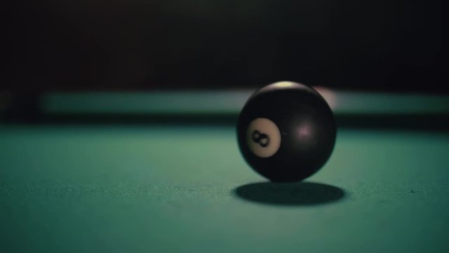 Closeup shot of 8th ball being hit, slow motion