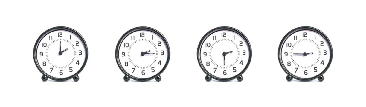 Closeup group of black and white clock for decoration show the time in 2 , 2:15 , 2:30 , 2:45 p.m. isolated on white background