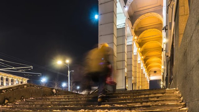 stream of people moving on stairs, of the building in Empire style time lapse