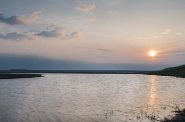 Obraz premium Sunrise over the steppe