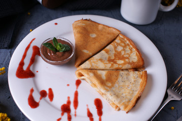 Pancakes with poppy seeds and chocolate paste
