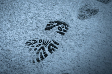 Fußabdruck im Schnee