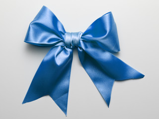 Blue Ribbon Bow with Real Shadow isolated on White Background