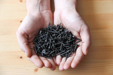 Full hands of screws