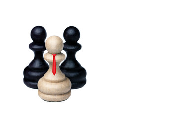 White chess pawn with red tie and two black pawns behind on the white background. Boss with his...