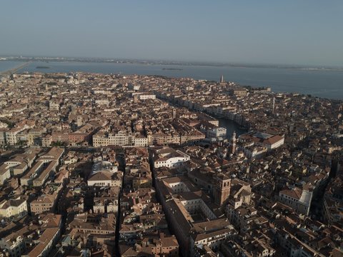 over the roofs of Venice Italy with a drone, drone photography in Italy, warm image