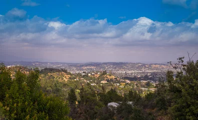 Schilderijen op glas Los Angeles county. View of the city from the Hollywood Hills © konoplizkaya