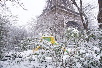 The Eiffel Tower and a Toboggan under fresh snow