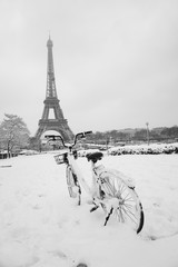Paris,  The eiffel tower fresh snow with bicycle