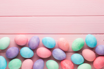 Pastel Easter eggs background. Spring greating card.