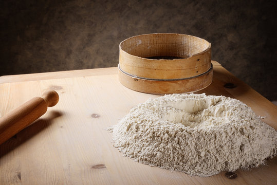 Pastri board, flour, rolling pin and sieve