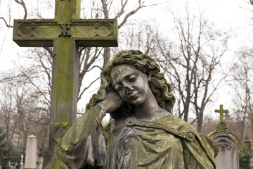 Historic sculpture from the mystery old Prague Cemetery, Czech Republic