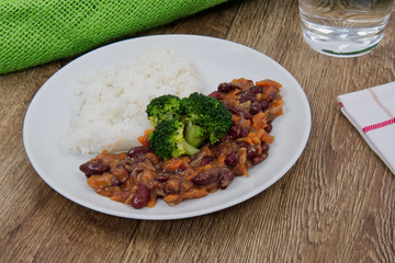 Azuki with vegetable and rice on table