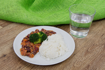 Azuki with vegetable and rice on table