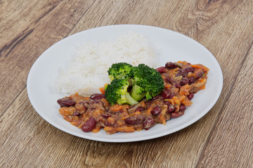 Azuki with vegetable and rice on table