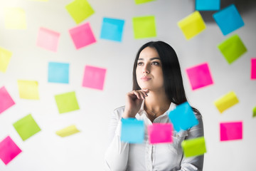 Creative woman Thinking use notes to share idea. Business office
