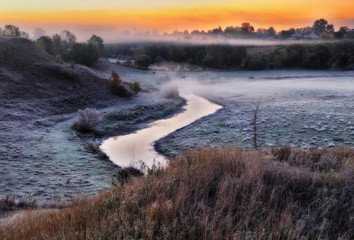 autumn morning. dawn by the river. picturesque fog