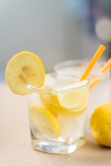 Glass of iced lemonade, cold drink in summer