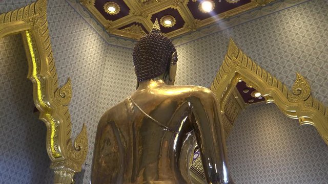 rear view of the solid gold buddha at wat traimit temple in bangkok, thailand