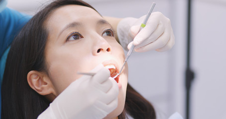 Patient undergo check up of teeth