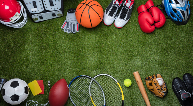 Various Sport Equipments On Grass