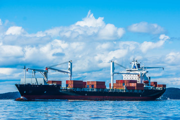 Fototapeta premium Cargo Ship Making Way