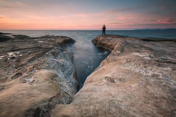 beautiful view of sunset seascape at Kudat, Sabah Malaysia. image contain soft focus due to ong...