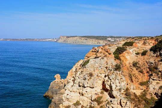 Elevated view of the rugged coastline and cliffs, Ponta da Piedade, Algarve, Portugal.