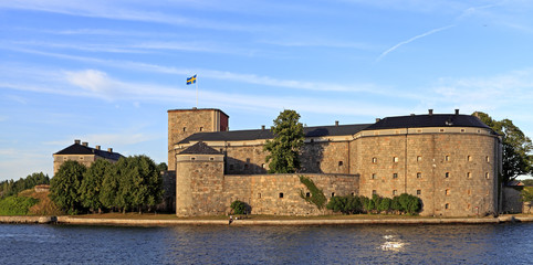 Stockholm, Vaxholm Island, Sweden - XVI century fortress Vaxholm situated on the island of Vaxholm within the Stockholm region - obrazy, fototapety, plakaty